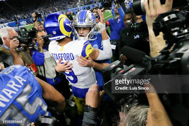 Los Angeles Rams quarterback Matthew Stafford and Detroit Lions quarterback Jared Goff hug after the Lions defeated the Rams 24-23 In the NFC...