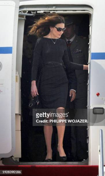 France's President Nicolas Sarkozy's wife Carla Bruni-Sarkozy arrives at the Shanghai airport, on April 30, 2010. Shanghai is to kick off the World...