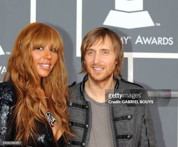 French DJ David Guetta and his wife Cathy arrive on the red carpet at the 52nd Grammy Awards in Los Angeles, California on January 31, 2010. AFP...