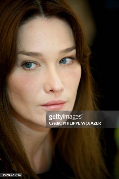 French first Lady Carla Bruni-Sarkozy attends an AIDS World fund meeting in Ouagadougou on February 11, 2009. Bruni-Sarkozy was in Burkina Faso on...