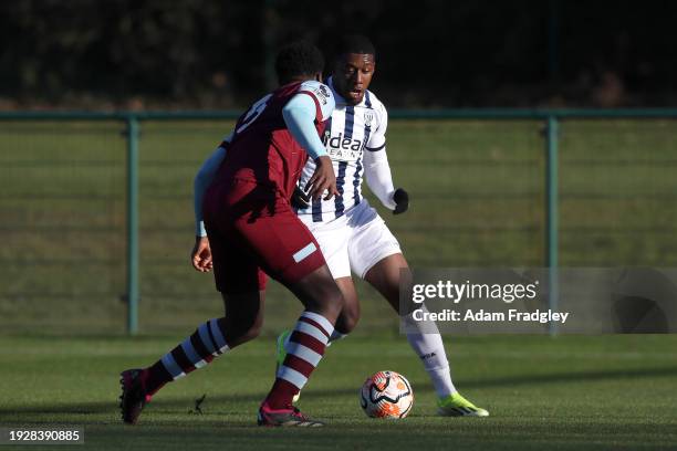 Jovan Malcolm of West Bromwich Albion dribbles the ball during a PL2 fixture between West Bromwich Albion and West Ham United at West Bromwich Albion...