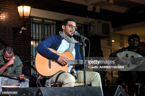 Sudanese singer Mazin Hamid performs during a concert at the Goethe institute in the Egyptian capital Cairo on November 26, 2023. When the first...