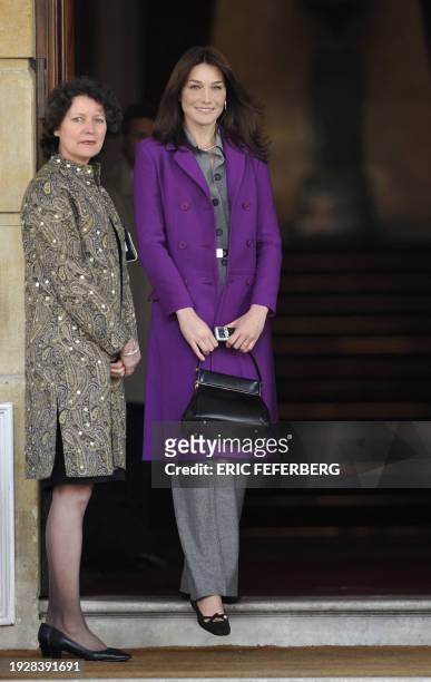 French First Lady Carla Bruni-Sarkozy and Executive Director of White Ribbon Alliance for Safe Motherhood Theresa Shaver pose prior to a lunch on...