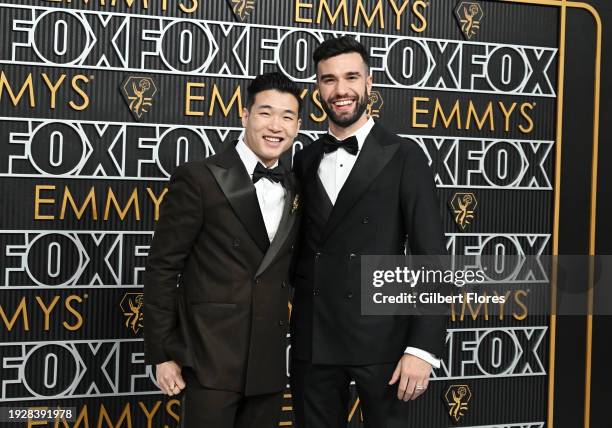 Joel Kim Booster and John-Michael Sudsina at the 75th Primetime Emmy Awards held at the Peacock Theater on January 15, 2024 in Los Angeles,...