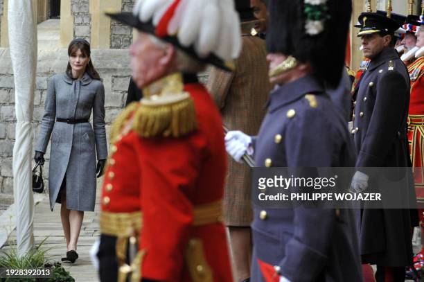 Carla Bruni-Sarkozy, the wife of France's President Nicolas Sarkozy, arrives to attend a welcome ceremony at the Windsor Castle, on March 26, 2008....