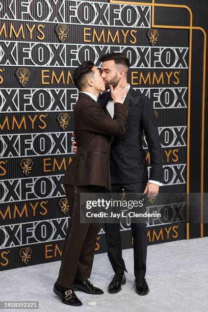 Los Angeles, CA Joel Kim Booster and John Michael Kelly arriving at the 75th Primetime Emmy Awards at the Peacock Theater in Los Angeles, CA, Monday,...