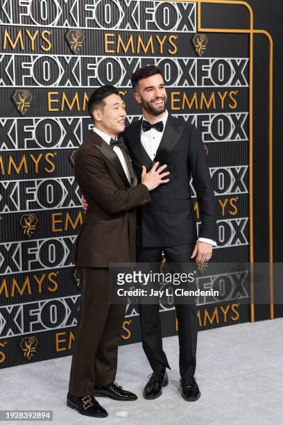 Los Angeles, CA Joel Kim Booster and John Michael Kelly arriving at the 75th Primetime Emmy Awards at the Peacock Theater in Los Angeles, CA, Monday,...