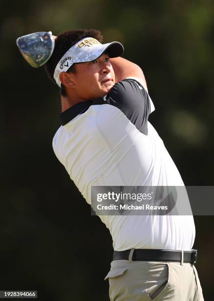 Carl Yuan of China plays his shot from the 16th tee during the second round of the Sony Open in Hawaii at Waialae Country Club on January 12, 2024 in...