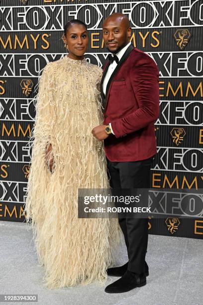 Actress Issa Rae and husband Louis Diame arrives for the 75th Emmy Awards at the Peacock Theatre at L.A. Live in Los Angeles on January 15, 2024.