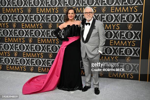 Scottish actor Brian Cox and wife Nicole Ansari-Cox arrive for the 75th Emmy Awards at the Peacock Theatre at L.A. Live in Los Angeles on January 15,...