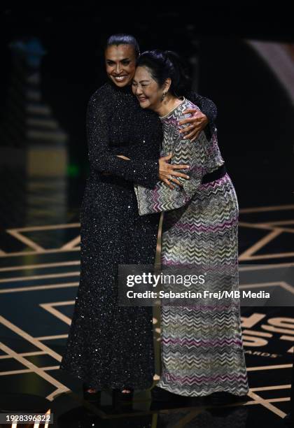 Special Award Winner, Marta Vieira da Silva and Marcia Aoki reacts on stage during The Best FIFA Football Awards 2023 at The Apollo Theatre on...