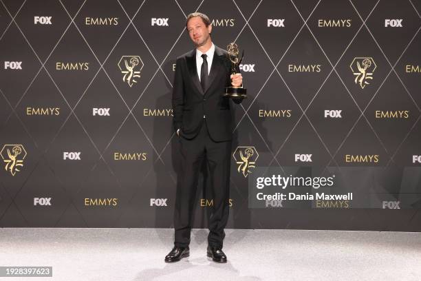 Los Angeles, CA Ebon Moss-Bachrach, winner of the Outstanding Supporting Actor in a Comedy Series award for "The Bear," poses in the press room...