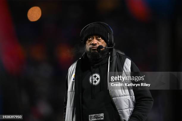 Mike Tomlin, head coach of the Pittsburgh Steelers stands on the sidelines during the first half of the NFL wild-card playoff football game against...