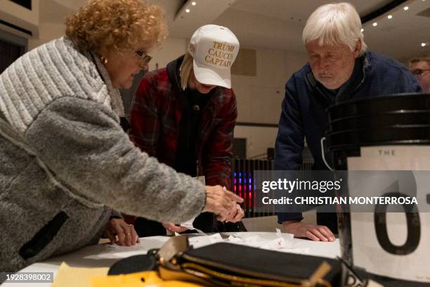 Iowa residents caucus for their preferred 2024 presidential candidate at Franklin Jr. High School in Des Moines, Iowa, on January 15, 2024....