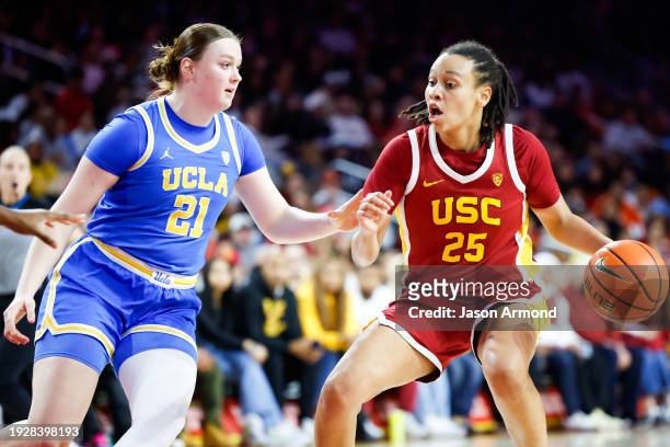 Trojans guard McKenzie Forbes handles the bal while UCLA Bruins forward Lina Sontag defends during the second half at Galen Center in Los Angeles on...