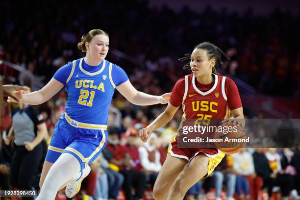Los Angeles, CA USC Trojans guard McKenzie Forbes drives the ball against UCLA Bruins forward Lina Sontag during the second half at the Galen Center...