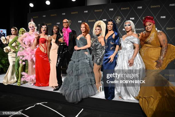 Outstanding Reality TV Competition Program winner RuPaul for "RuPaul's Drag Race" poses in the press room with Drag performers during the 75th Emmy...