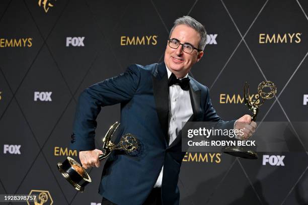 John Oliver, winner of Outstanding Scripted Variety and Outstanding Writing for a Variety Series "Last Week Tonight with John Oliver" poses in the...