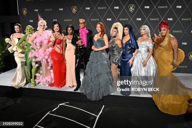 Outstanding Reality TV Competition Program winner RuPaul for "RuPaul's Drag Race" poses in the press room with Drag performers during the 75th Emmy...