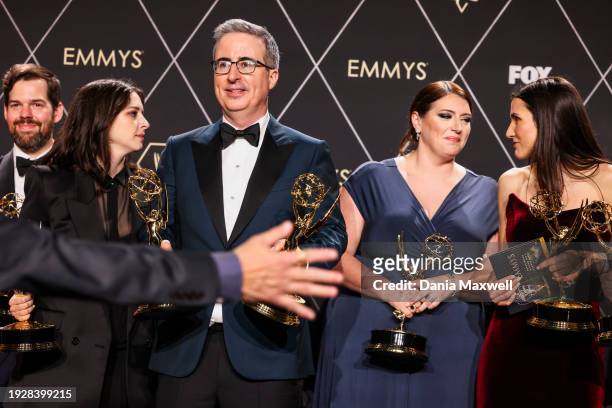 Los Angeles, CA Outstanding Writing For A Variety Series winners, John Oliver center, for "Last Week Tonight with John Oliver" at the 75th Primetime...