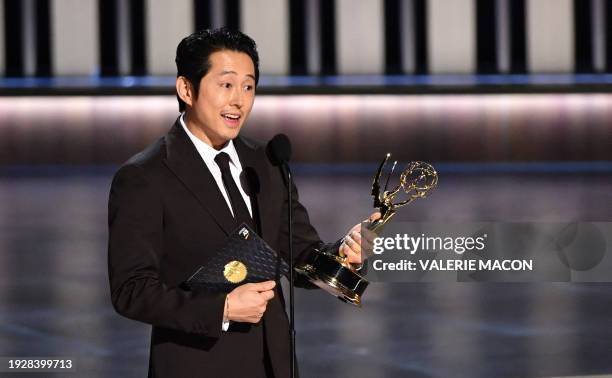 Actor Steven Yeun accepts the award for Outstanding Lead Actor in a Limited or Anthology Series or Movie for "Beef" onstage during the 75th Emmy...