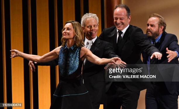 Actress Calista Flockhart, US actor Greg Germann, Canadian actor Gil Bellows and US actor Peter MacNicol perform a sketch onstage during the 75th...