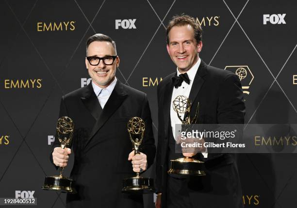 David Furnish and Luke Lloyd Davies, winners of Outstanding Variety Special for "Elton John Live: Farewell From Dodger Stadium," pose in the press...