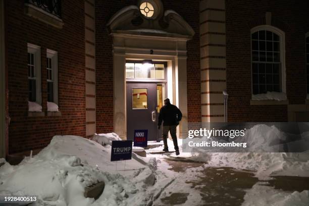 Participant arrives for the 2024 Iowa Republican caucuses at Iowa City High School in Iowa City, Iowa, US, on Monday, Jan. 15, 2024. Former...