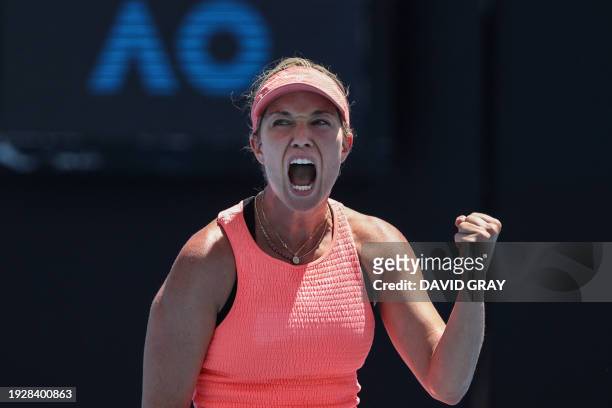 S Danielle Collins reacts after a point against Germany's Angelique Kerber during their women's singles match on day three of the Australian Open...