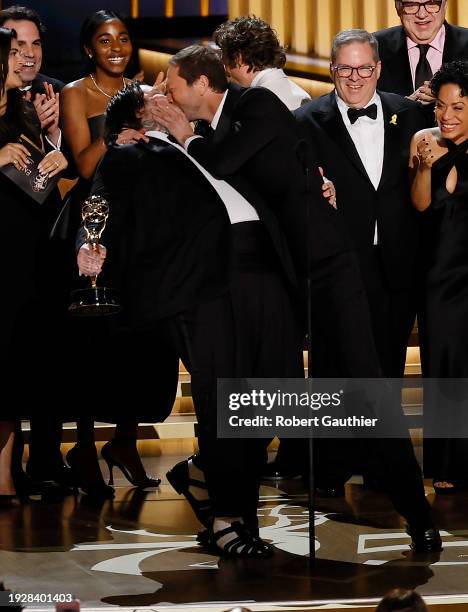 Los Angeles, CA Matty Matheson and Ebon Moss-Bachrach kiss with the cast of 'The Bear' at the 75th Primetime Emmy Awards at the Peacock Theater in...