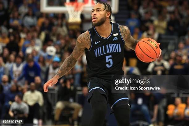 Villanova Wildcats guard Justin Moore dribbles during a game between the Marquette Golden Eagles and the Villanova Wildcats at Fiserv Forum on...