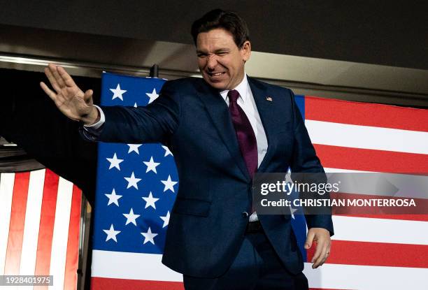 Florida Governor and Republican presidential hopeful Ron DeSantis arrives at a watch party during the 2024 Iowa Republican presidential caucuses in...