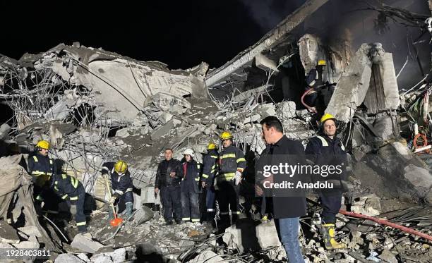 Teams carry out search and rescue operations after unmanned aerial vehicle attacks in Erbil, Iraq on January 16, 2024. Several explosions were...