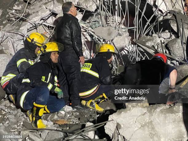 Teams carry out search and rescue operations after unmanned aerial vehicle attacks in Erbil, Iraq on January 16, 2024. Several explosions were...