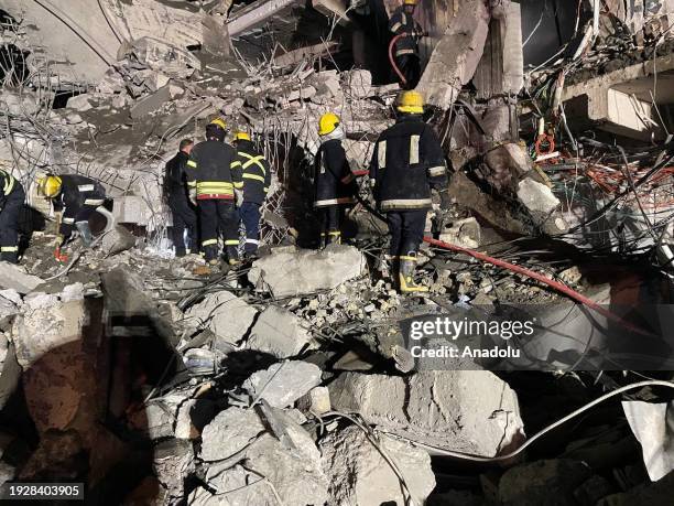 Teams carry out search and rescue operations after unmanned aerial vehicle attacks in Erbil, Iraq on January 16, 2024. Several explosions were...