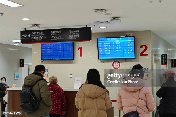 Patients are making appointments, paying fees, and collecting medicine at a hospital in Shanghai, China, on January 16, 2024.