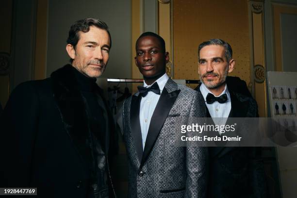 Models pose backstage at the Billionaire fashion show during the Milan Menswear Fall/Winter 2024-2025 on January 12, 2024 in Milan, Italy.