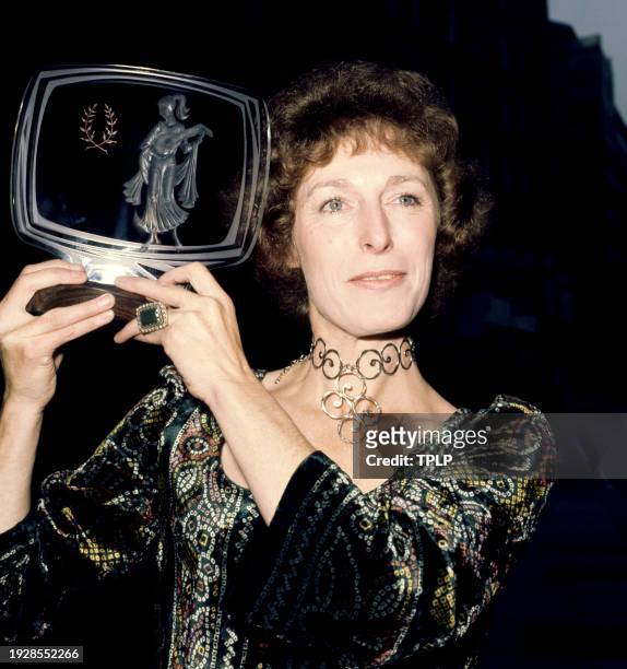 British actress Helen Ryan smiling as she holds up her Female Personality of the Year award during the Pye Color Television Awards at the Grosvenor...