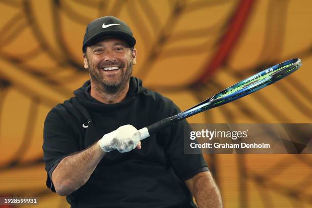 David Wagner of the United States smiles during the Kids Tennis Day Arena Spectacular ahead of the 2024 Australian Open at Melbourne Park on January...