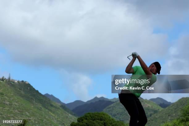 Harry Hall of England plays his shot from the seventh tee during the second round of the Sony Open in Hawaii at Waialae Country Club on January 12,...