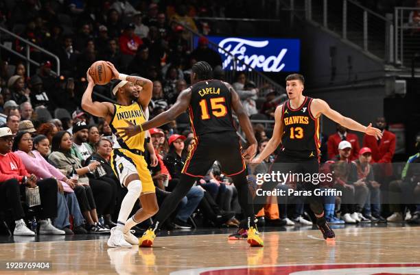Bruce Brown of the Indiana Paces pass the ball during the game against the Atlanta Hawks on January 12, 2024 at State Farm Arena in Atlanta, Georgia....
