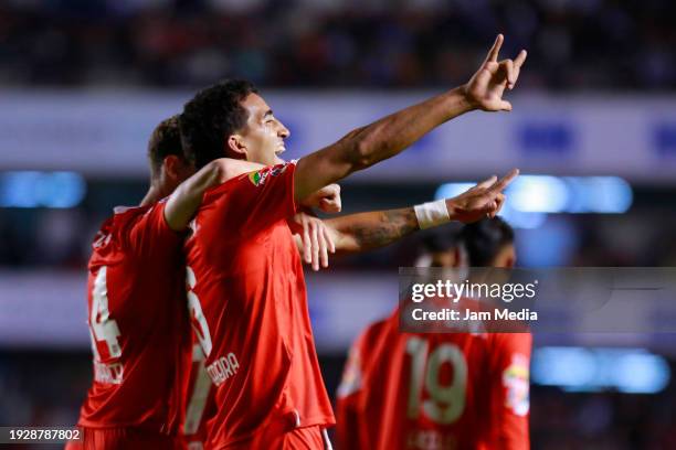 Federico Pereira of Toluca celebrates with his teammates after scoring the team's second goal during the 1st round match between Queretaro and Toluca...