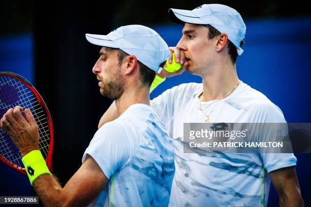 Joran Vliegen and Sander Gille pictured in action during a doubles tennis match between Belgian pair Gille-Vliegen and Czech-Chinese pair...