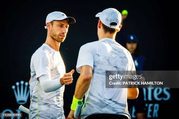 Joran Vliegen and Sander Gille pictured in action during a doubles tennis match between Belgian pair Gille-Vliegen and Czech-Chinese pair...