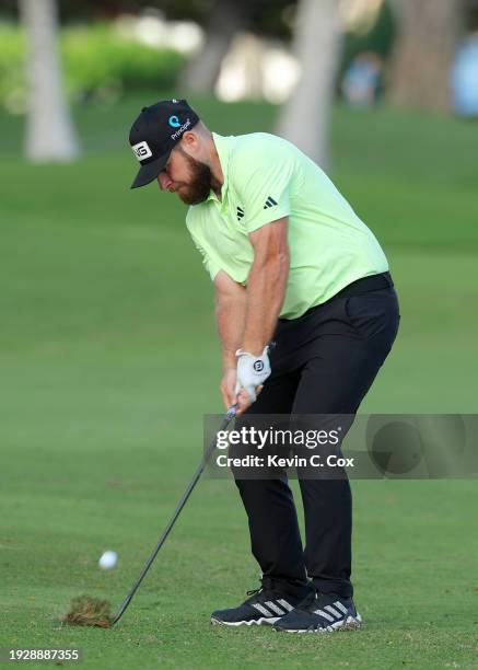 Tyrrell Hatton of England plays a shot on the 16th hole during the second round of the Sony Open in Hawaii at Waialae Country Club on January 12,...