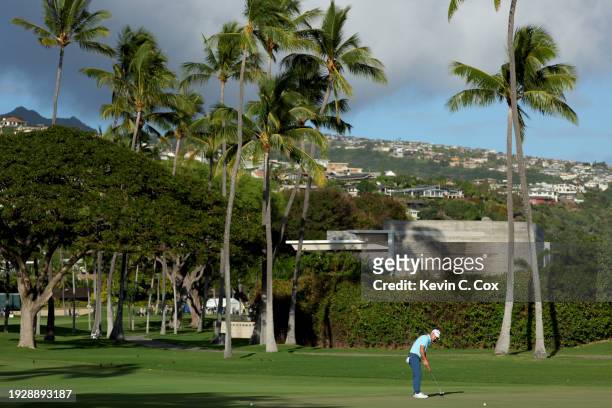 Brian Harman of the United States putts on the 16th green during the second round of the Sony Open in Hawaii at Waialae Country Club on January 12,...
