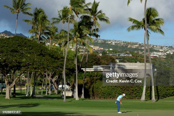 Brian Harman of the United States putts on the 16th green during the second round of the Sony Open in Hawaii at Waialae Country Club on January 12,...