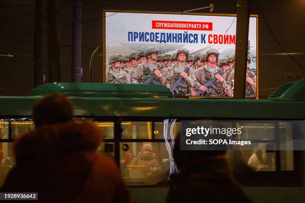 Russian Ministry of Defense billboard is calling citizens to volunteer to join the special military operation on the territory of Ukraine with the...