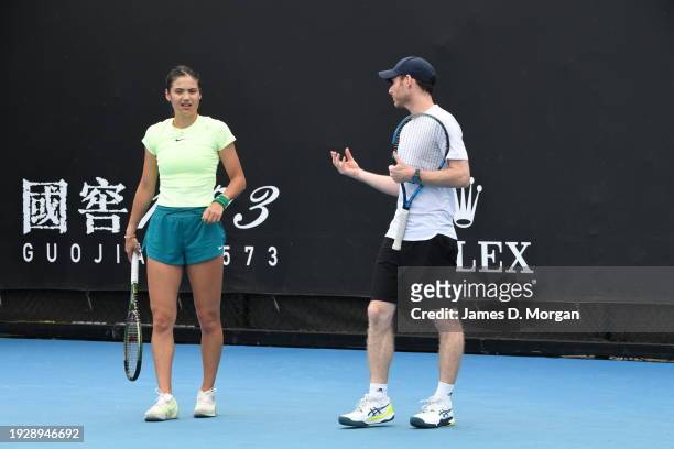 Emma Raducanu of Great Britain and her coach Nick Cavaday on court during a training session ahead of the 2024 Australian Open at Melbourne Park on...
