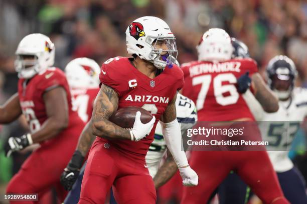 Running back James Conner of the Arizona Cardinals rushes the football against the Seattle Seahawks during the second half of the NFL game at State...